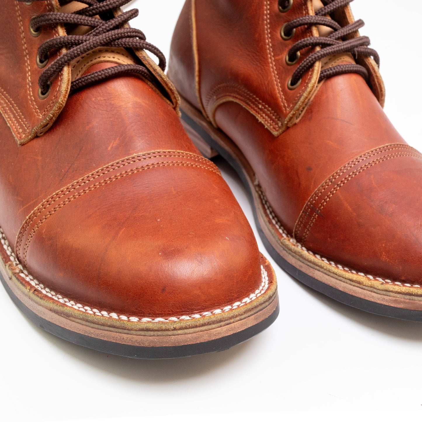 Captoe boots left 11.5E right 12E